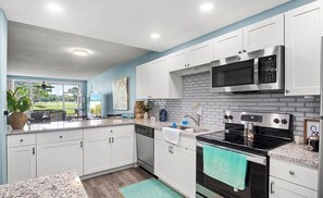 Microwave, oven, stovetop, dishwasher - Golf/Water View Condo
 (Sarasota)