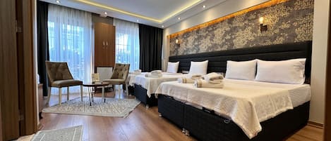 Family Studio, Non Smoking, City View | 1 bedroom, Egyptian cotton sheets, premium bedding, down duvets