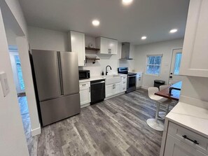 Fridge, microwave, dishwasher, coffee/tea maker