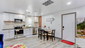 Coffee/tea maker, fridge, microwave, oven