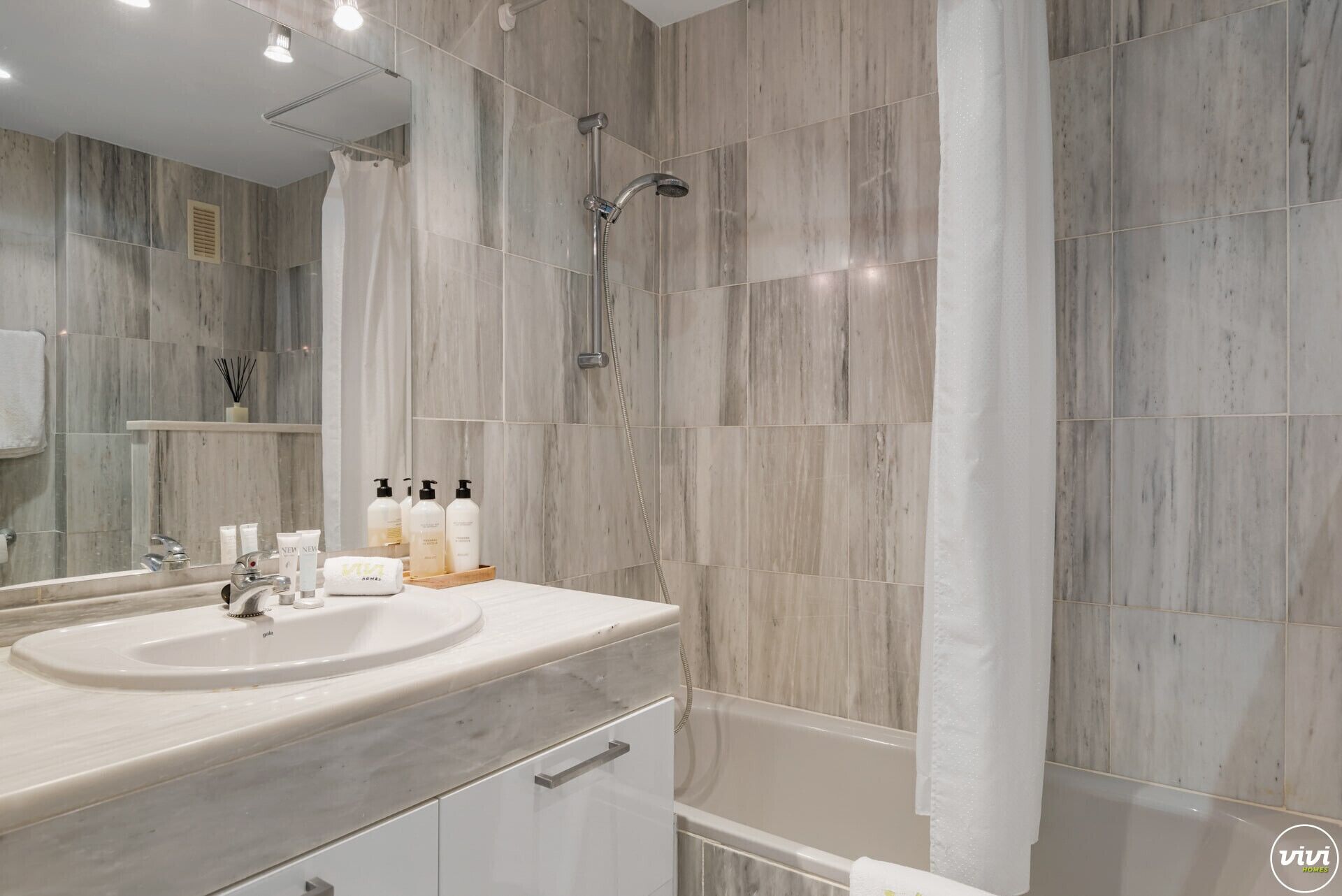 Hair dryer, towels, soap, shampoo