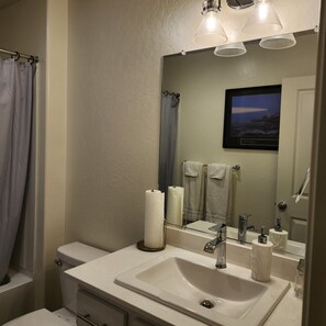 Hair dryer, towels, soap, shampoo