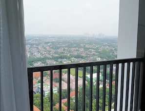 Deluxe Studio, 1 King Bed, City View | Balcony view