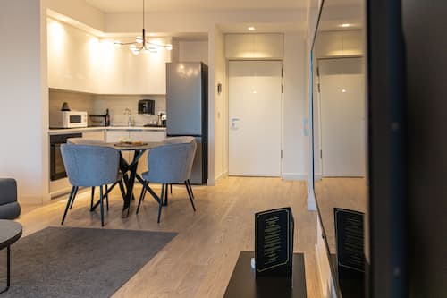 Superior Apartment | Living area | 32-inch LCD TV with cable channels