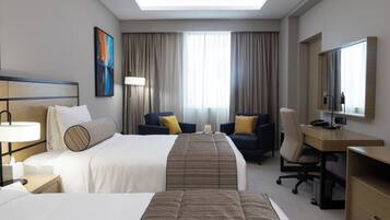 Premium bedding, down comforters, minibar, in-room safe