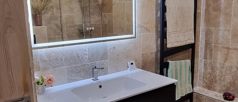 Shower, hair dryer, towels, soap