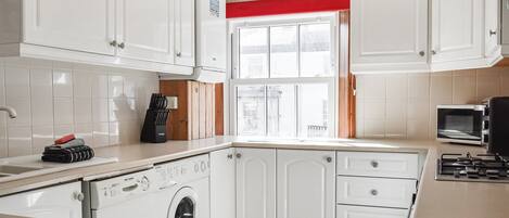 Dishwasher, highchair, cookware/dishes/utensils