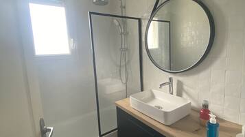 Shower, hair dryer, towels, soap