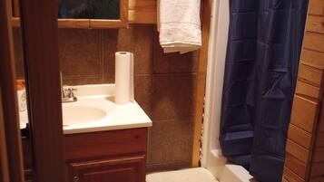 Shower, towels, soap, shampoo