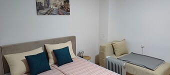 In a quiet part of the city, with a free parking space and a private terrace.