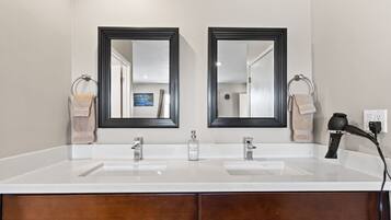 Hair dryer, towels, soap, shampoo