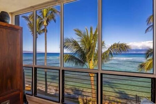 Stunning Beachfront Remodeled Corner 2 bedroom condo