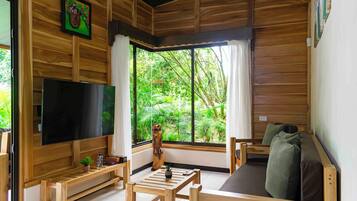 Superior Villa, 2 Bedrooms | Living area | 55-inch Smart TV with digital channels