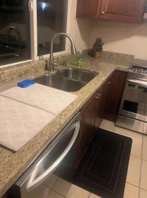 Fridge, microwave, oven, stovetop - Cozy condo 2 minutes from the beach at a tennis resort gated community  (Playas de Rosarito)