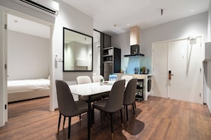 Deluxe Apartment, 3 Bedrooms, Kitchen, City View | Living area - THE ONE Saigon Luxury Citypoint (Ho Chi Minh City)