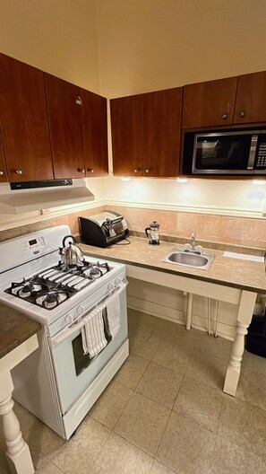Fridge, microwave, oven, stovetop - Charming Brick Home in Seneca Falls Historic District! (Seneca Falls)