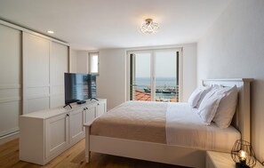 6 habitaciones, tabla de planchar con plancha y cuna de viaje