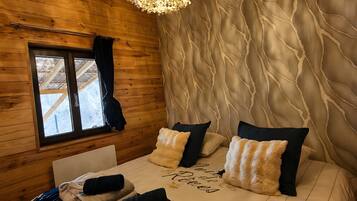 2 dormitorios, tabla de planchar con plancha, wifi gratis y ropa de cama