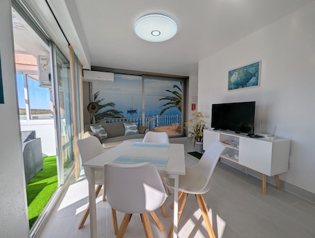 Interior. Modern Apartment 450m from the Beach with Shared Pool, Wi-Fi & Air Conditioning