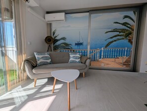 TV - Modern Apartment 450m from the Beach with Shared Pool, Wi-Fi & Air Conditioning (La Mata)