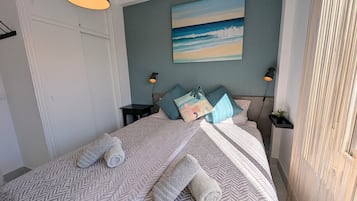 Een strijkplank/strijkijzer, gratis wifi, beddengoed