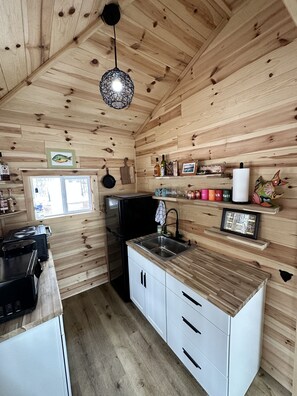 Fridge, microwave, cookware/dishes/utensils