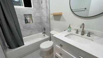 Rainfall showerhead, free toiletries, hair dryer, towels
