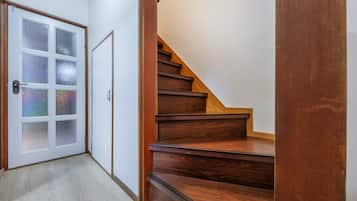 Rumah Kota | Area keluarga | Televisi layar datar 55-inci dengan saluran TV digital