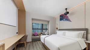 A modern hotel room with a large bed, a desk, and a window with a city view. - Elong Hotel Shenzhen South China City (Shenzhen)