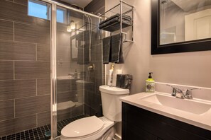 Shower, hair dryer, towels, soap