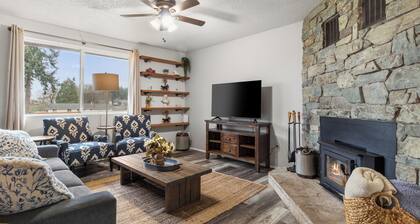 Cozy 3BR modern farmhouse in Rochester with stone fireplace, fenced yard, and easy I-5 access.