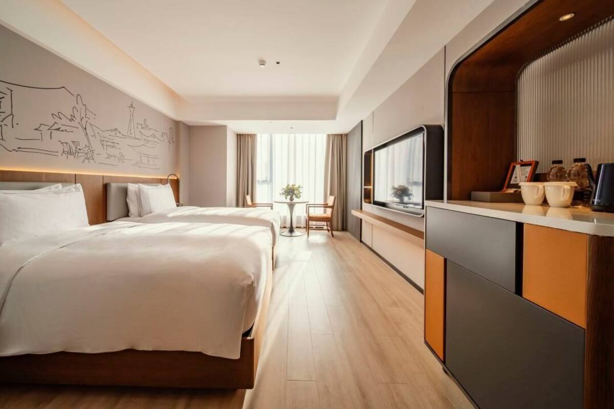Quarto duplo empresarial | Frigobar (abastecido com alguns itens grátis), cofres nos quartos