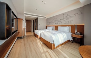 Habitación empresarial con 2 camas individuales, para no fumadores | Artículos del minibar gratis y caja de seguridad en la habitación