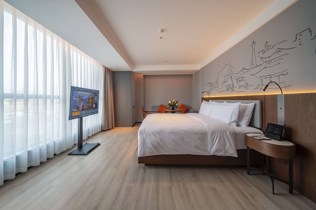 Free minibar items, in-room safe, laptop workspace, blackout curtains