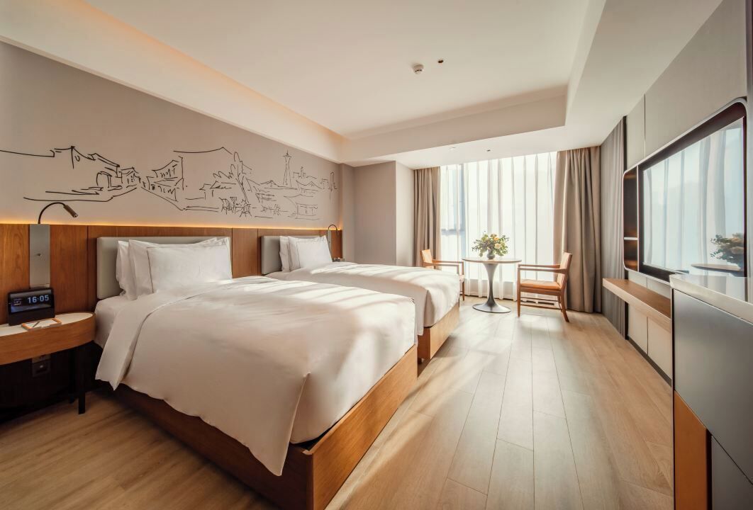 Free minibar items, in-room safe, laptop workspace, blackout drapes