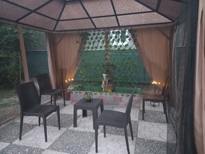 Terrace/patio - Take a break and unwind at this peaceful oasis called Xion House Jamaica (Spanish Town)