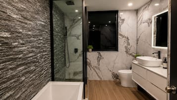 Shower, jetted tub, hair dryer, bidet