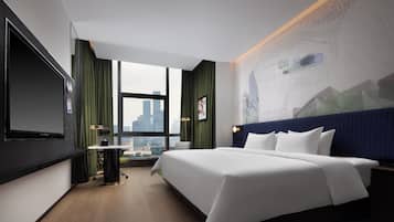 Deluxe Room | Free minibar, desk, blackout curtains, iron/ironing board