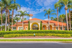 A building with a red-tiled roof, arched windows, and a clock tower. - Ihr11304ha - Solana Resort - 4 Bed 2 Baths Villa (Davenport)