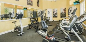A gym with treadmills, weight machines, and dumbbells. - Ffv11400ha - Terra Verde Resort - 4 Bed 3 Baths Townhome (Kissimmee)