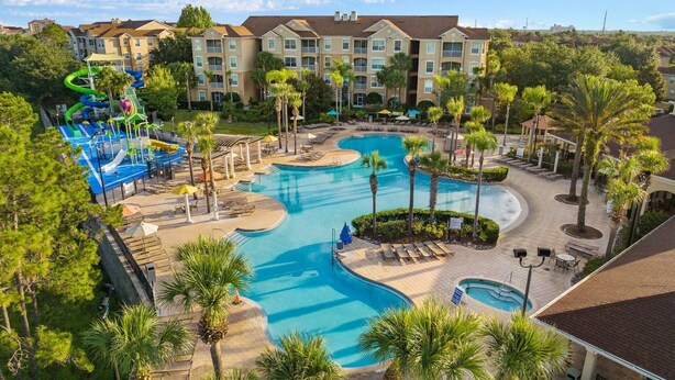 A resort with a large pool area, multiple swimming pools, and a water park. - It11510ha - Windsor Hill - 2 Bed 2 Baths Condo (Kissimmee)