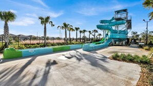 A water park with a multi-level water slide structure.