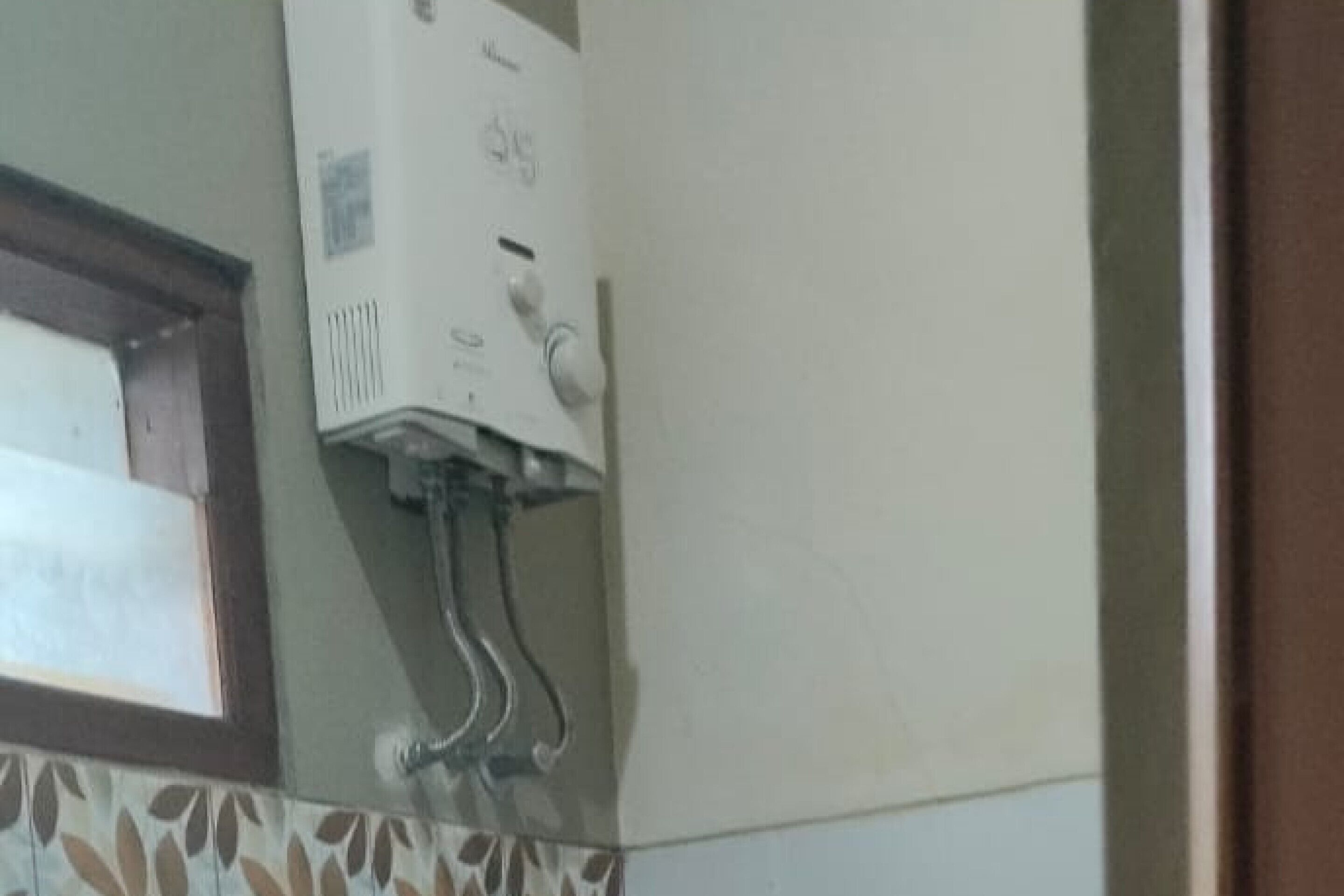 Foto - Hotel O Homestay Koe Syariah