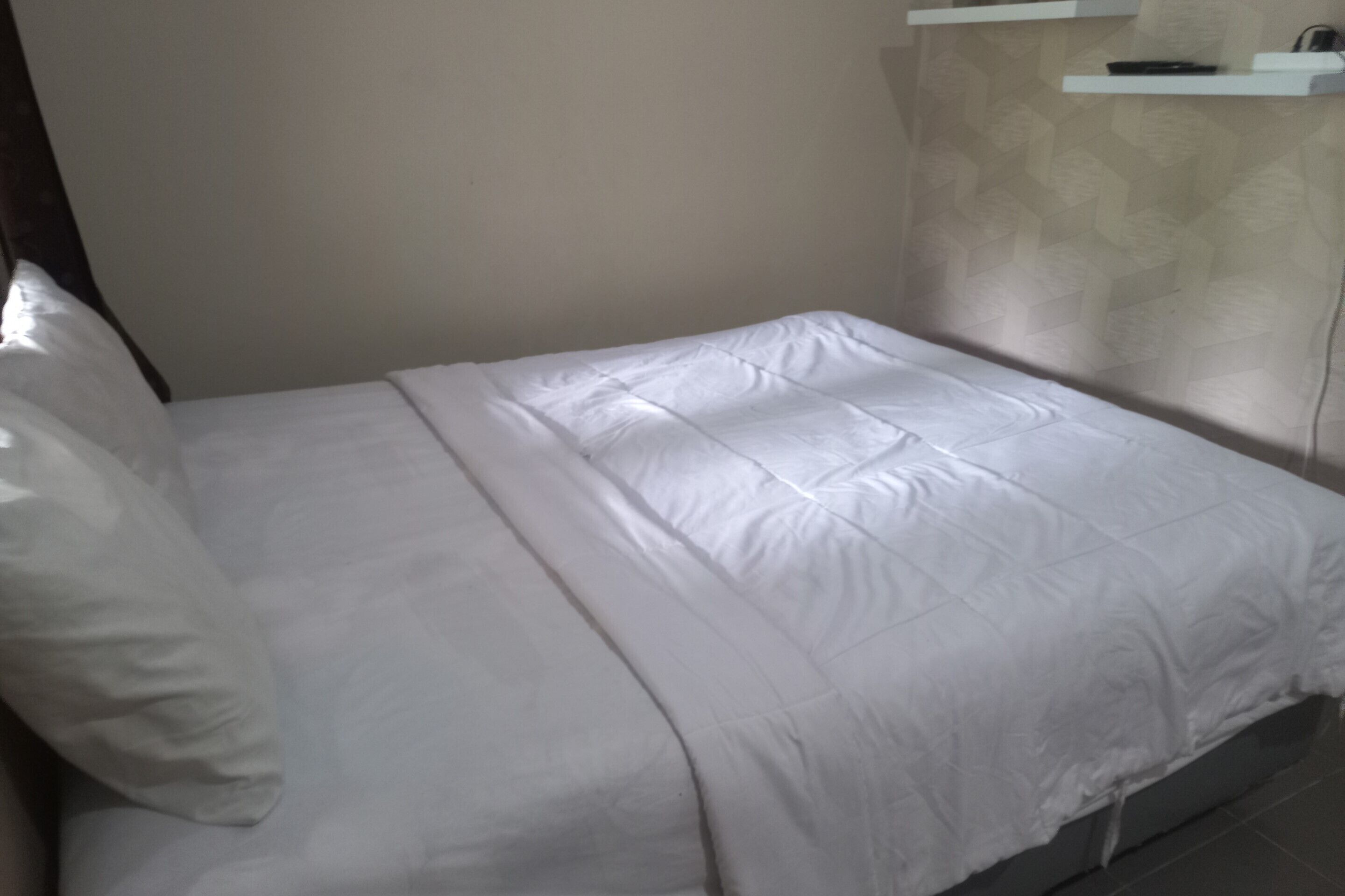 Foto - Hotel O Homestay Koe Syariah