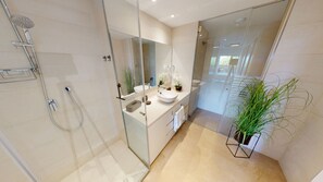 Shower, hair dryer, towels