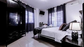 Habitación básica con 1 cama matrimonial o 2 individuales | Wifi gratis y ropa de cama