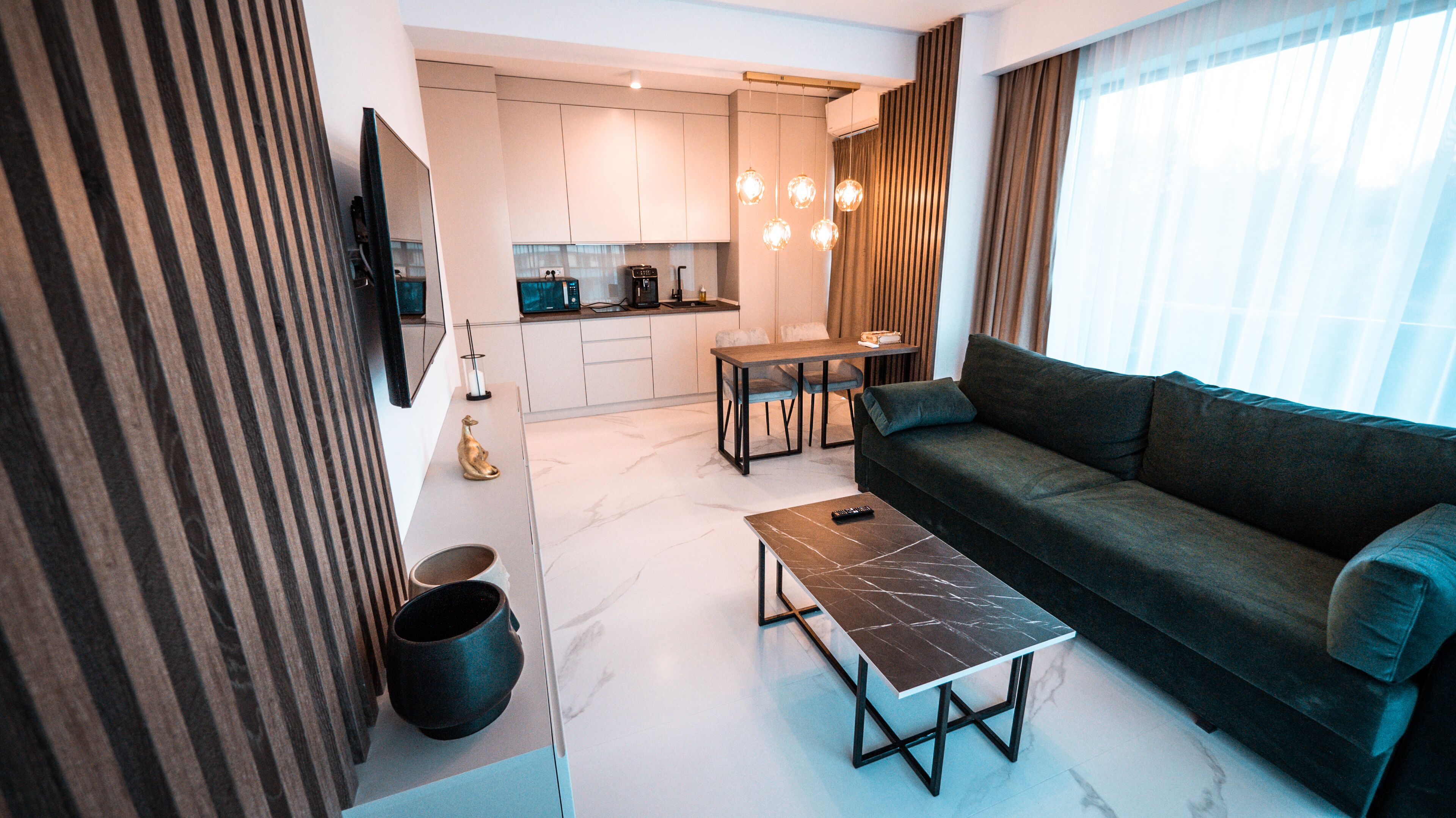 Apartment, 1 Bedroom, Partial Sea View | Living area | 100-cm LED TV with cable channels, heated floors