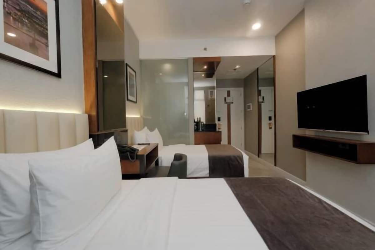 Premium bedding, memory foam beds, minibar, in-room safe