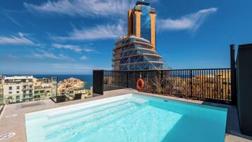 Outdoor pool, open 8:00 AM to 6:00 PM, sun loungers