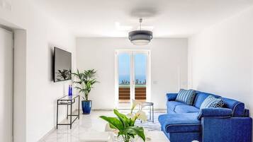 4 habitaciones, tabla de planchar con plancha y acceso a internet